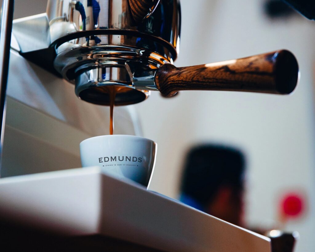 An Edmunds branded coffee cup